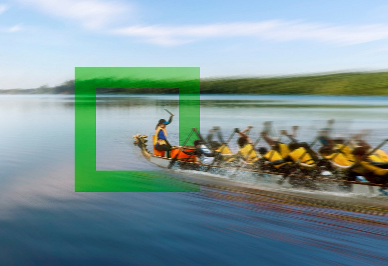 Dragon Boat travelling at speed with green square