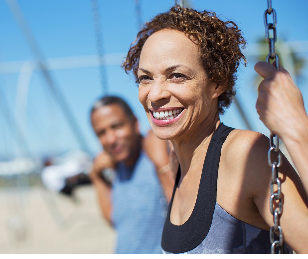 Woman sitting on a swing