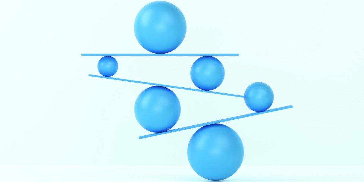 Blue spheres balanced on angled blue rods against a light background