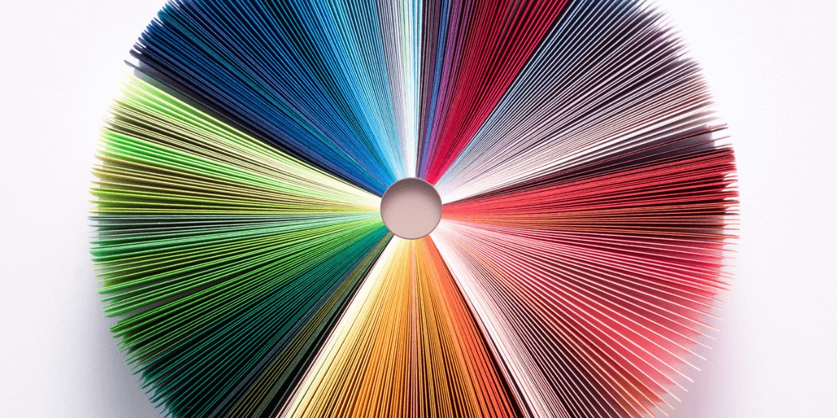 Circle with multi coloured strands surrounding
