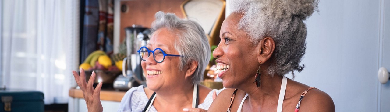 two ladies smiling