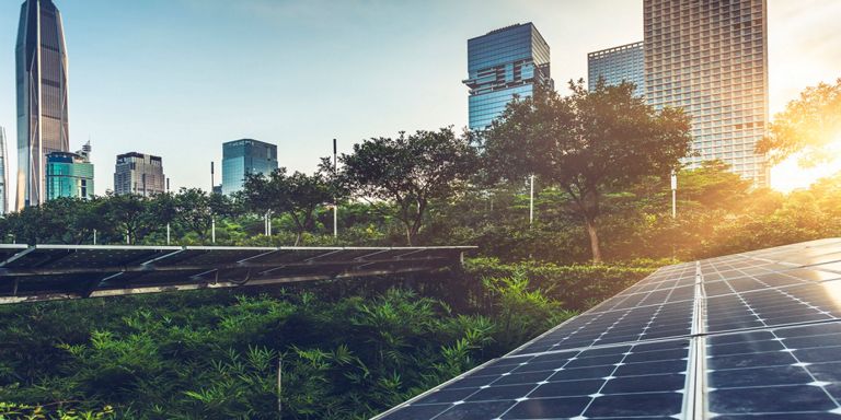 Roof top solar installation with shenzhen downtown skyline view as background,China.
