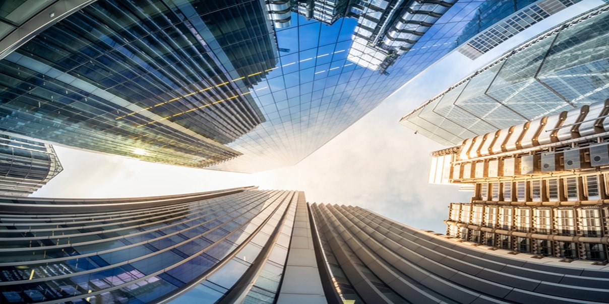 Looking up perspective of financial buildings. Financial business concept