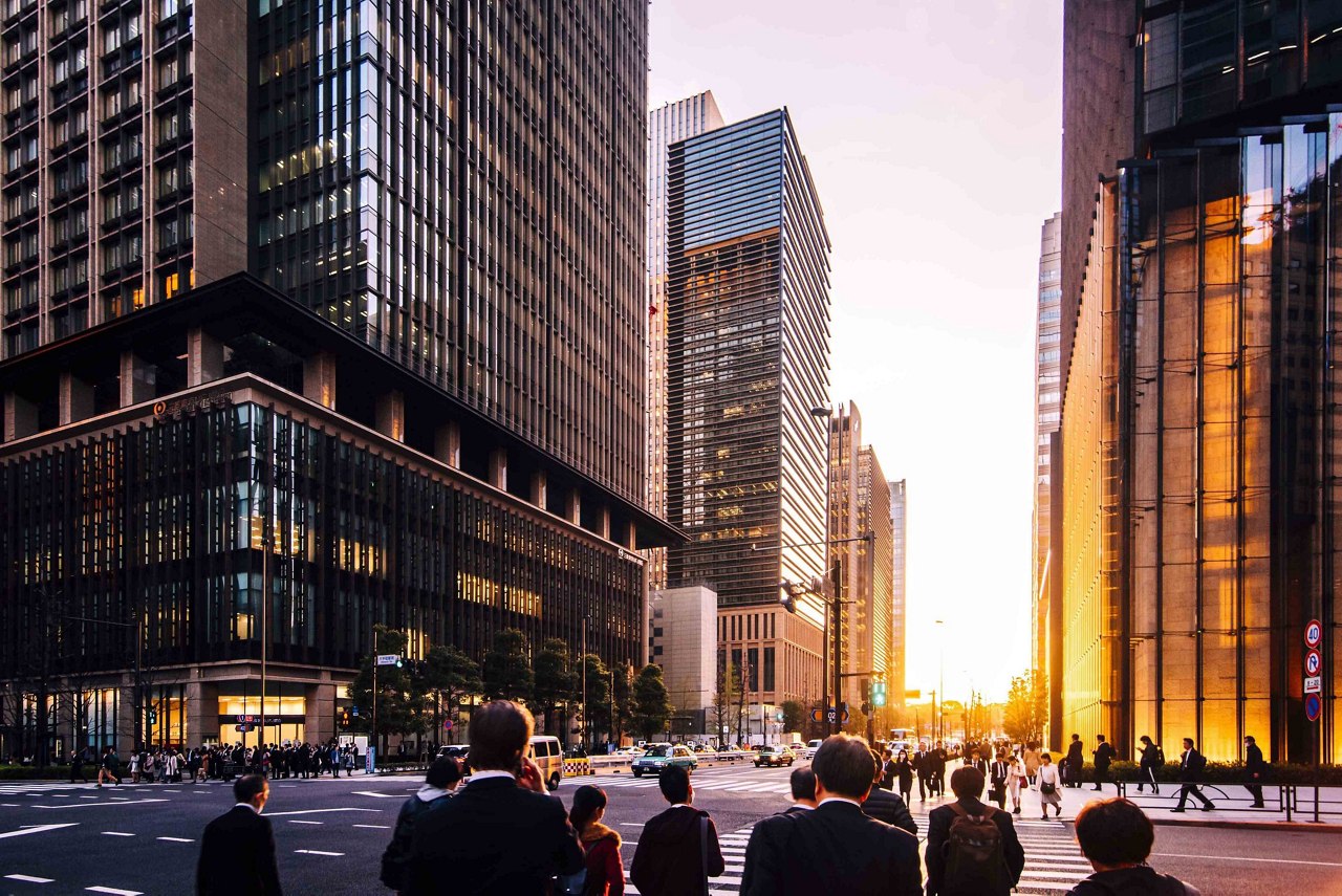 view of entrepreneur walking on road against building in city